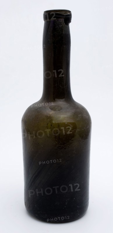 Cylindrical bottle, bottle holder bottomfound glass, hand-blown glass application Cylindrical bottle in clear brown-green glass