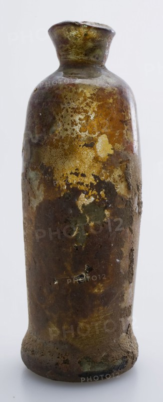Medicine Bottle, medicine bottle bottle holder soil find glass, free blown and shaped Small (medicine?) Bottle in clear light