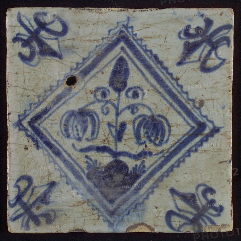Tile, double flower on spot in blue on white, inside serrated square, corner pattern french lily, wall tile tile sculpture