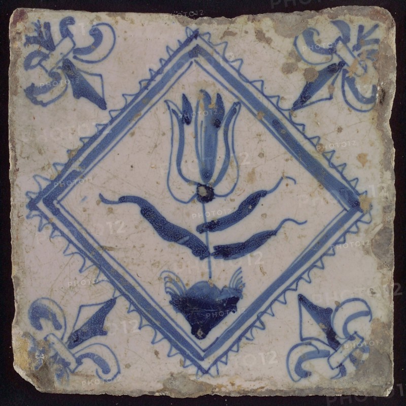 Tile, tulip on ground in blue on white, inside serrated square, corner pattern french lily, wall tile tile sculpture ceramic
