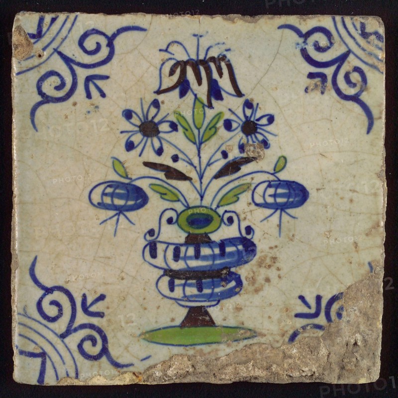 Tile, flower pot in blue, purple and green on white, corner motif big ox head, wall tile tile sculpture ceramic earthenware