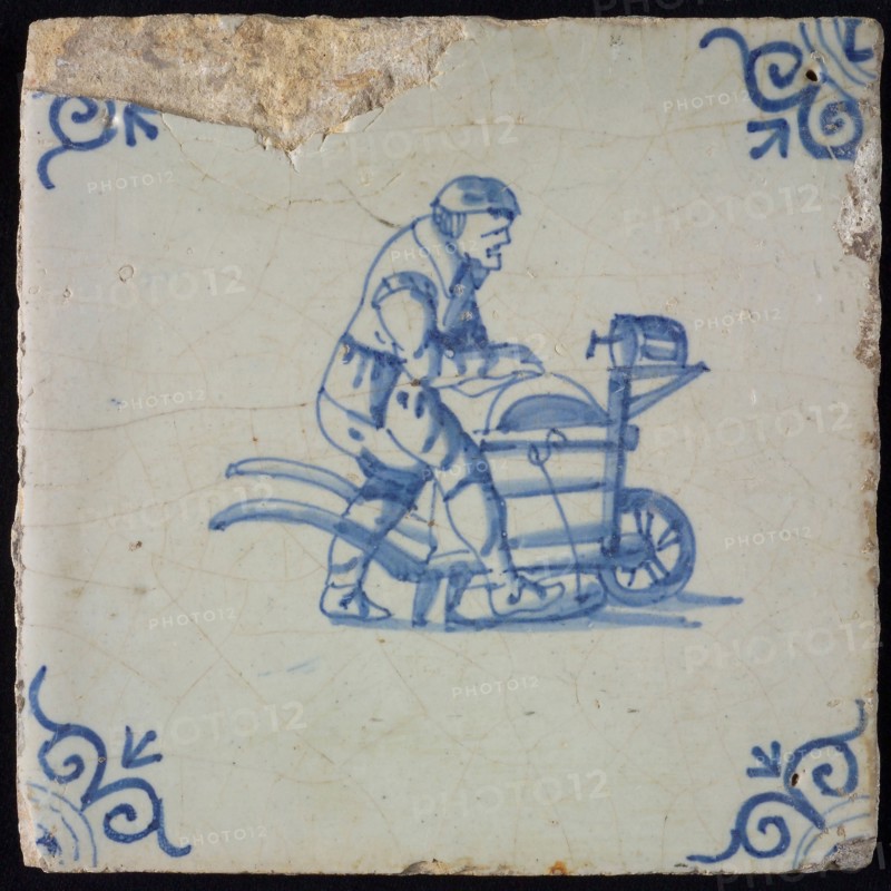 Occupation tile, blue with shear blade, corner motif oxen head, wall tile tile sculpture ceramic earthenware glaze wood, baked