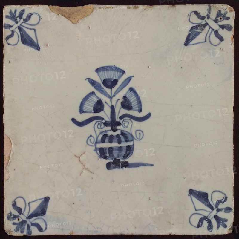 Tile, small flower pot in blue on white, corner pattern french lily, wall tile tile sculpture ceramic earthenware glaze, baked