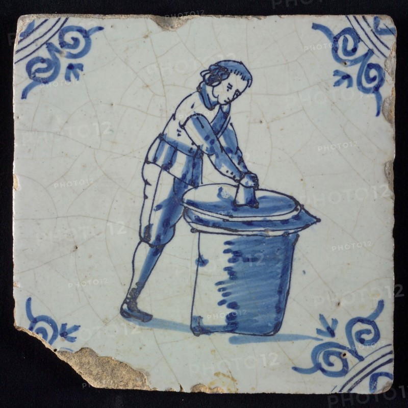 Occupation tile, blue with paint maker or potter, corner motif of ox's head, wall tile tile sculpture ceramic earthenware glaze