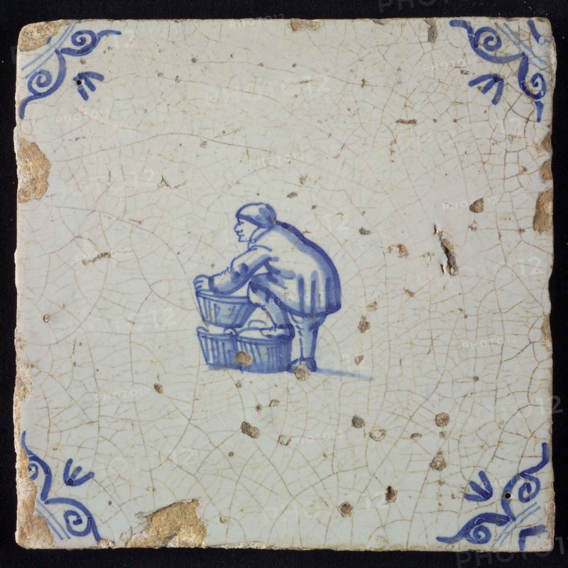Occupation tile, blue with basket-maker, corner motif of ox-head, wall tile tile sculpture ceramic earthenware glaze, baked 2x
