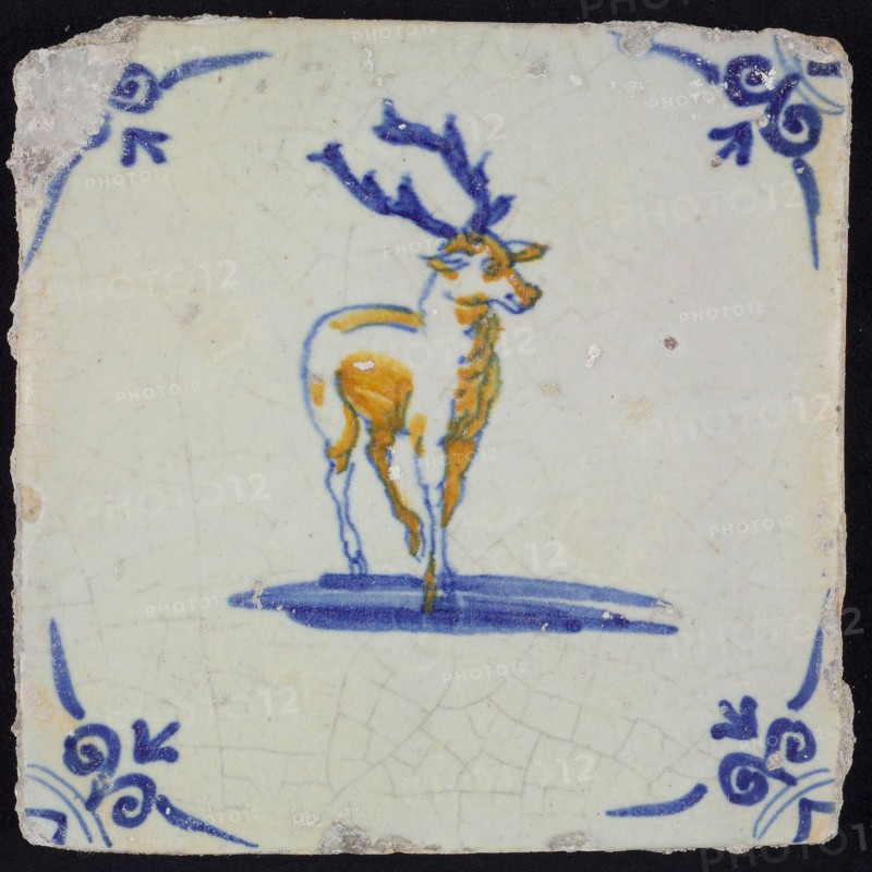 Animal tile, deer to the right in blue and brown on white, corner motif ox's head, wall tile tile sculpture ceramic earthenware