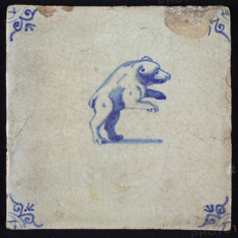 Animal tile, upright bear to the right in blue on white, corner motif ox's head, wall tile tile sculpture ceramic earthenware