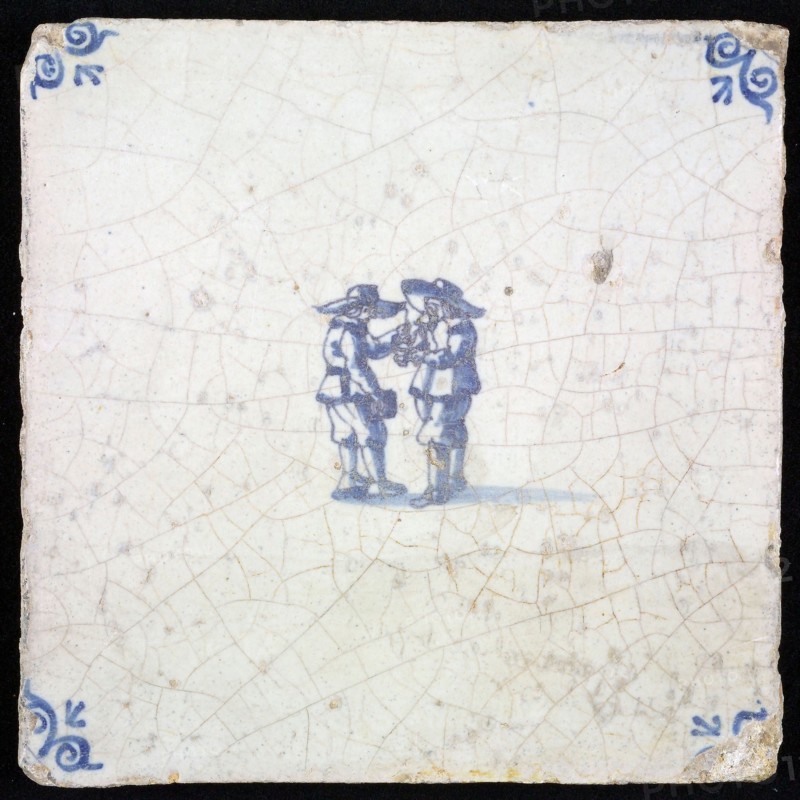 Figure tile, blue with two standing men with big hats and beer cans, corner pattern ox head, wall tile tile sculpture ceramic