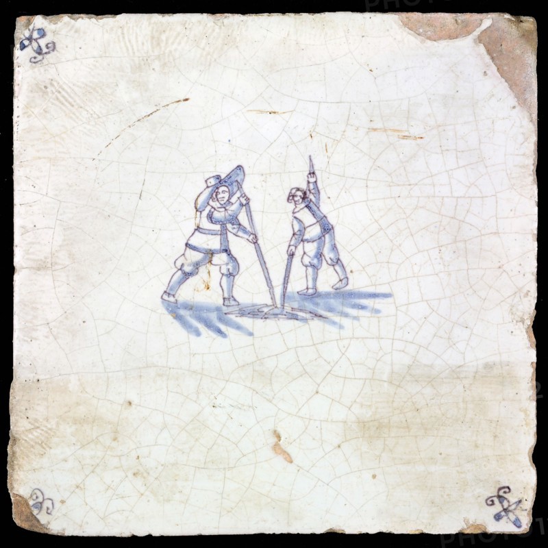 Figure tile, blue with two with men sticking with sticks in the ground, corner motif spider, wall tile tile sculpture ceramic