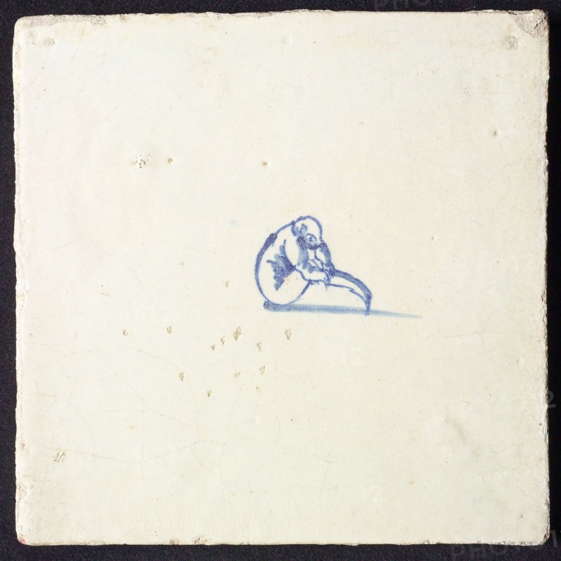 Animal tile, sitting unknown animal to the right, in blue on white, without corner motif, wall tile tile sculpture ceramic
