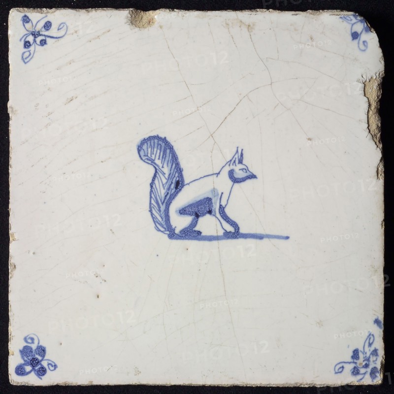 Animal tile, sitting squirrel to the right, in blue on white, corner motif spider, wall tile tile sculpture ceramic earthenware