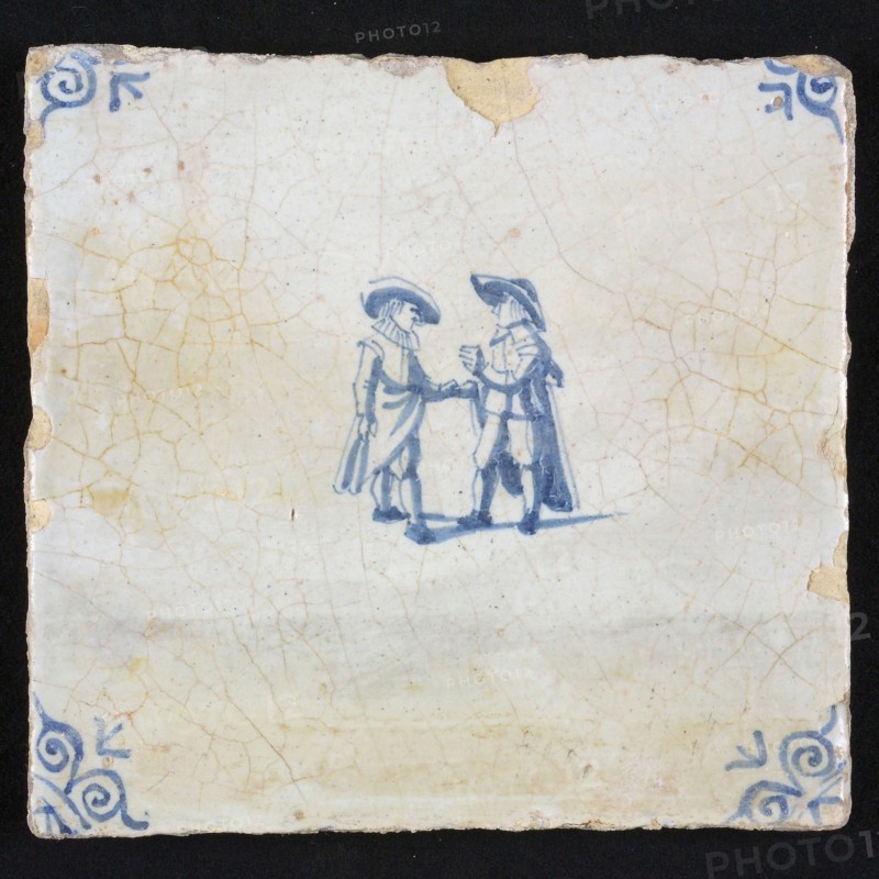 Figure tile, blue with two noblemen in conversation, corner motif ox's head, wall tile tile sculpture ceramic earthenware glaze