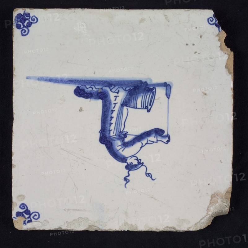 Figure tile, blue with Chinese, Barrel on the ground, man holds rope with weight in his hands, corner pattern spider, wall tile