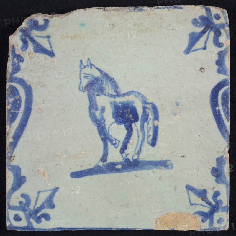 Animal tile, walking horse left between balusters, in blue on white, corner pattern french lily, wall tile tile sculpture