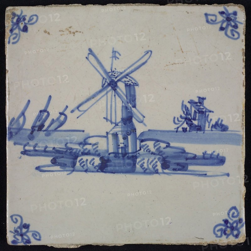 Scene tile, blue with landscape with stand mill, corner motif spider, wall tile tile sculpture ceramic earthenware glaze, baked