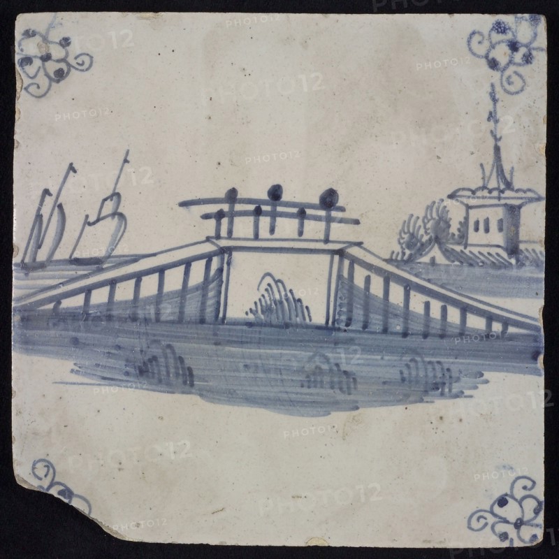 Scene tile, blue with landscape with bridge, corner motif spider, wall tile tile sculpture ceramic earthenware glaze, baked 2x