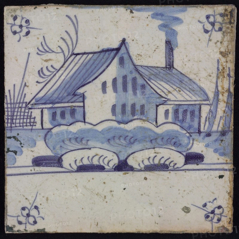 Scene tile, blue with landscape with building or shed, corner motif spider, wall tile tile sculpture ceramic earthenware glaze