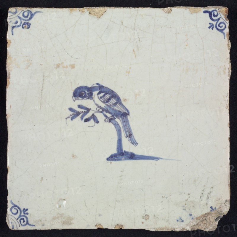 Animal tile, bird on branch to the left, in blue on white, corner motif ox's head, wall tile tile sculpture ceramic earthenware