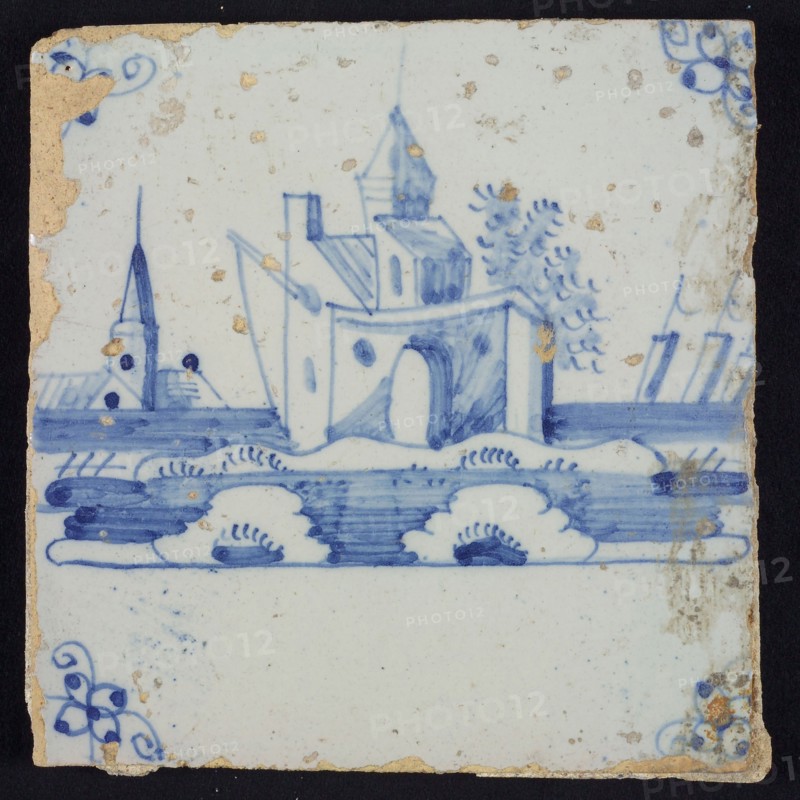 Scene tile, blue with landscape with fortress, in the background church, corner motif spider, wall tile tile sculpture ceramic