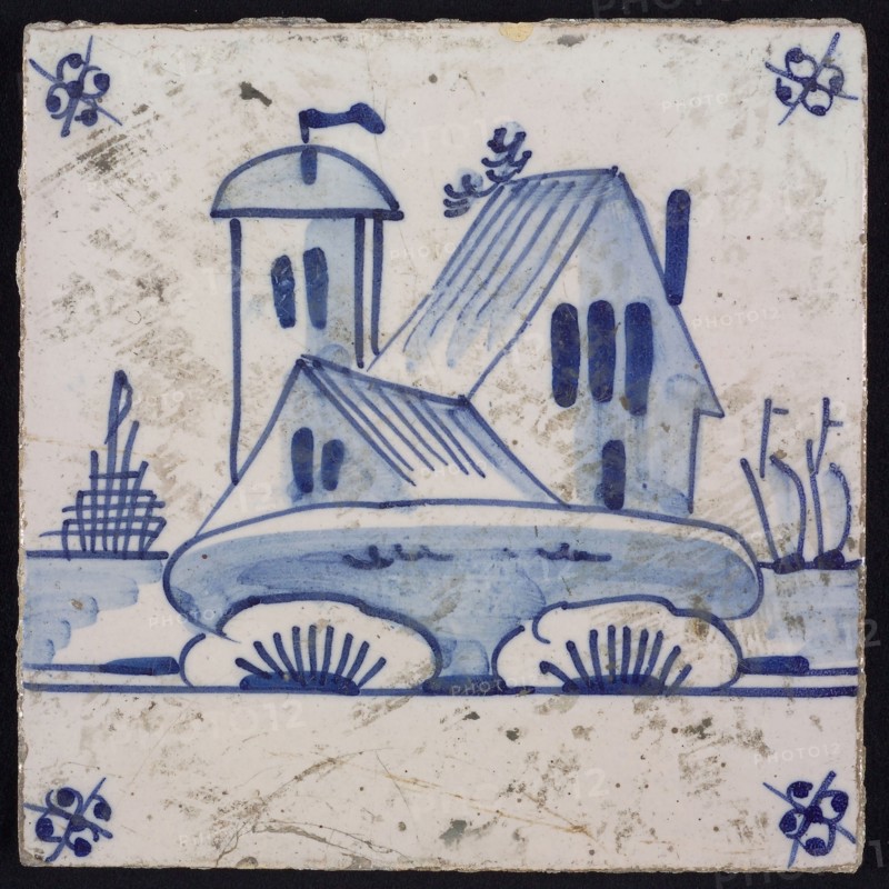 Scene tile, blue with landscape with houses and dome tower, corner motif spider, wall tile tile sculpture ceramic earthenware