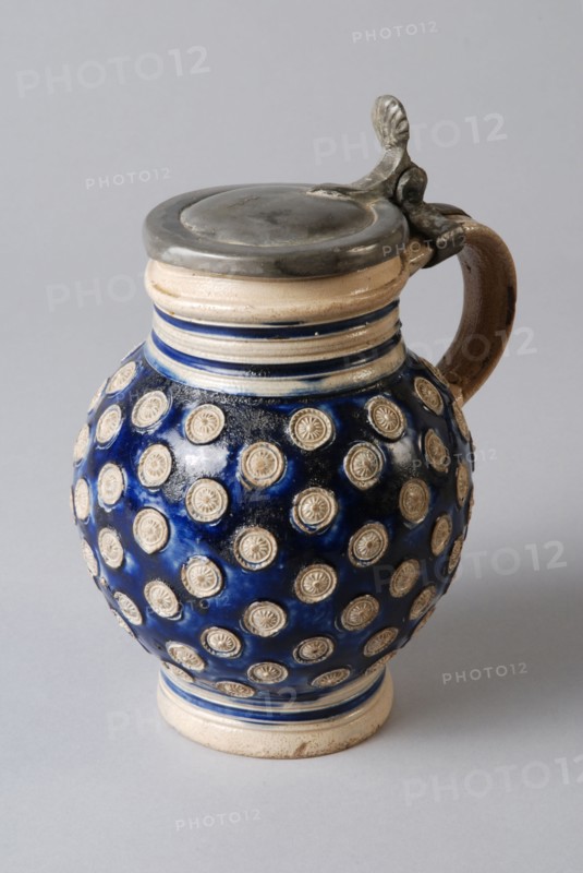 Stoneware bell jar on foot, completely covered with small appliqués, rosettes, tin lid, bullet-bell jar crockery holder soil