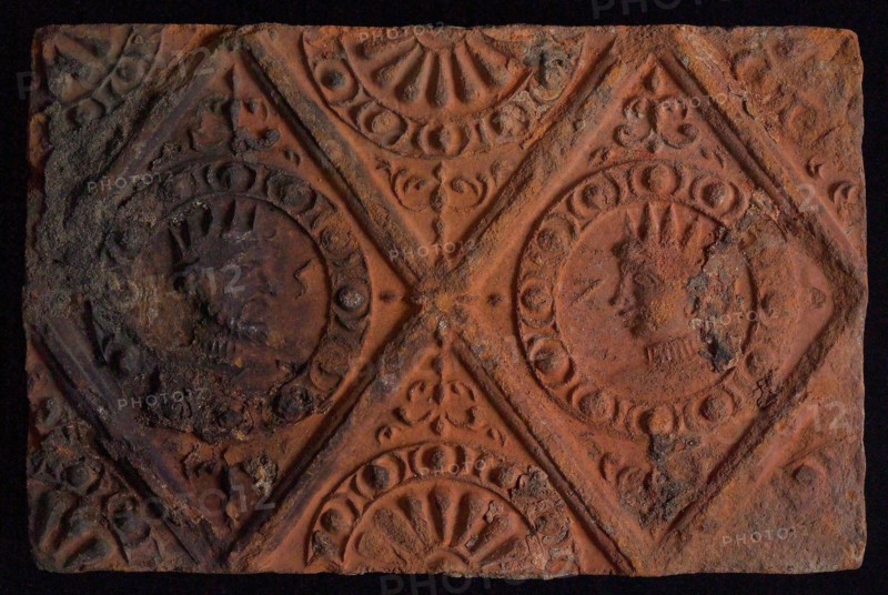 Hearthstone, from Antwerp Belgium, without frame, with crowned male and female head, hearth fireplace component ceramics brick