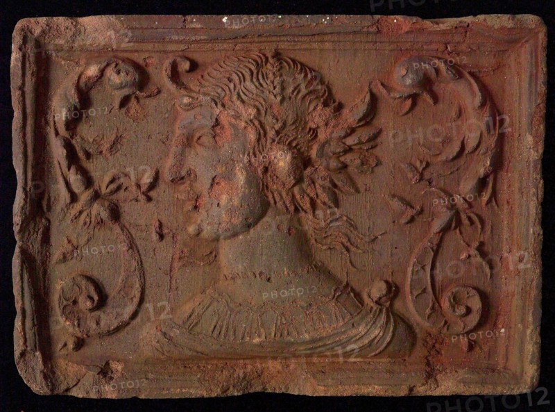 Hearthstone, from Antwerp Belgium, with narrow frame, with woman's head and dolphin's fads, hearth fireplace component ceramics