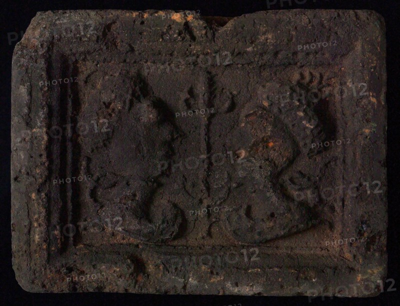 Hearthstone, Luiks, from Luik, Liege Belgium, with wide frame, with male and female head, hearth fireplace part ceramic brick