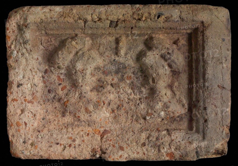 Hearthstone, Luiks, from Luik, Liege Belgium, with wide frame, with male and female head, hearth fireplace part ceramic brick