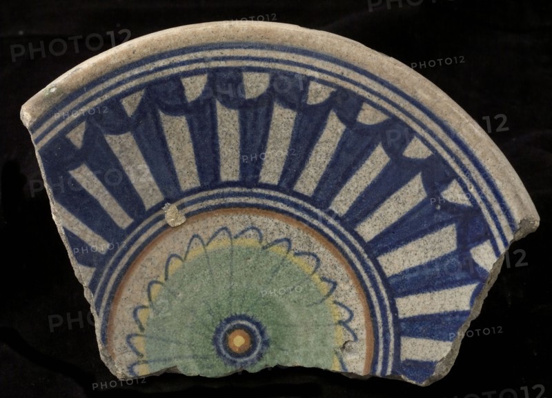 Fragment of the majolica dish, polychrome, in the middle rosette, surrounded by geometrical patterns, plate crockery holder soil