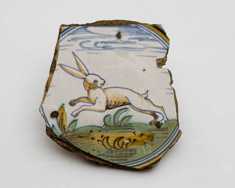 Fragment majolica dish, polychrome, jumping hare on the ground, plate dish crockery holder soil find ceramic pottery glaze
