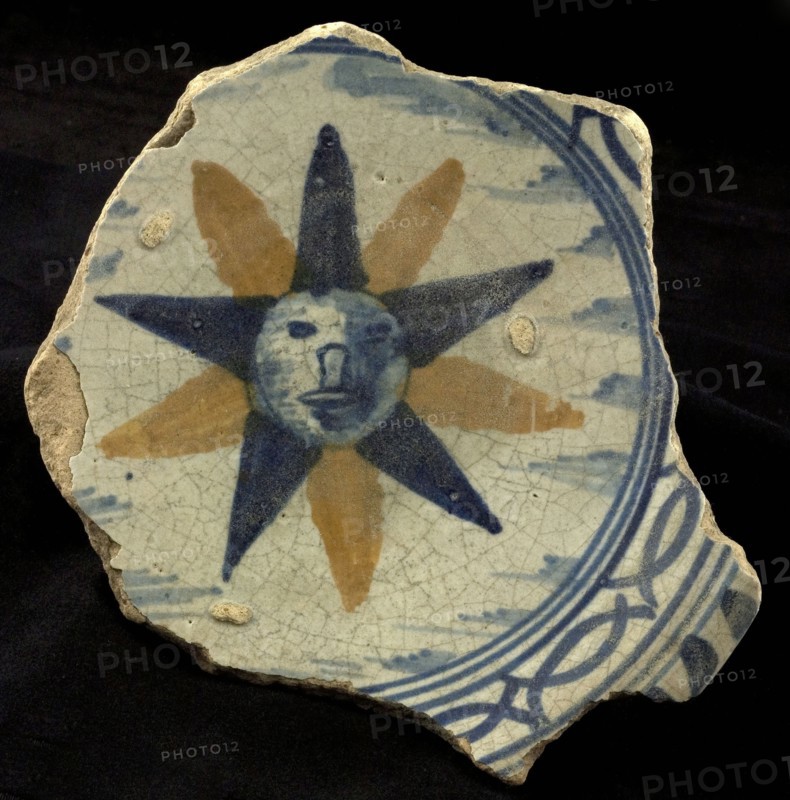 Fragment majolica plate, polychrome, two-colored ten-pointed star with face, plate crockery holder soil find ceramic earthenware