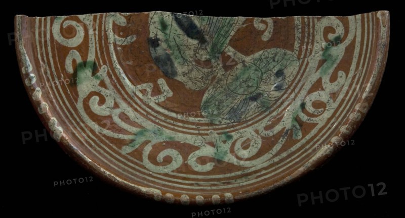 Fragment Werra plate, mirror decor with bird and plant, year 1612, pale yellow and green glaze, plate crockery holder earth
