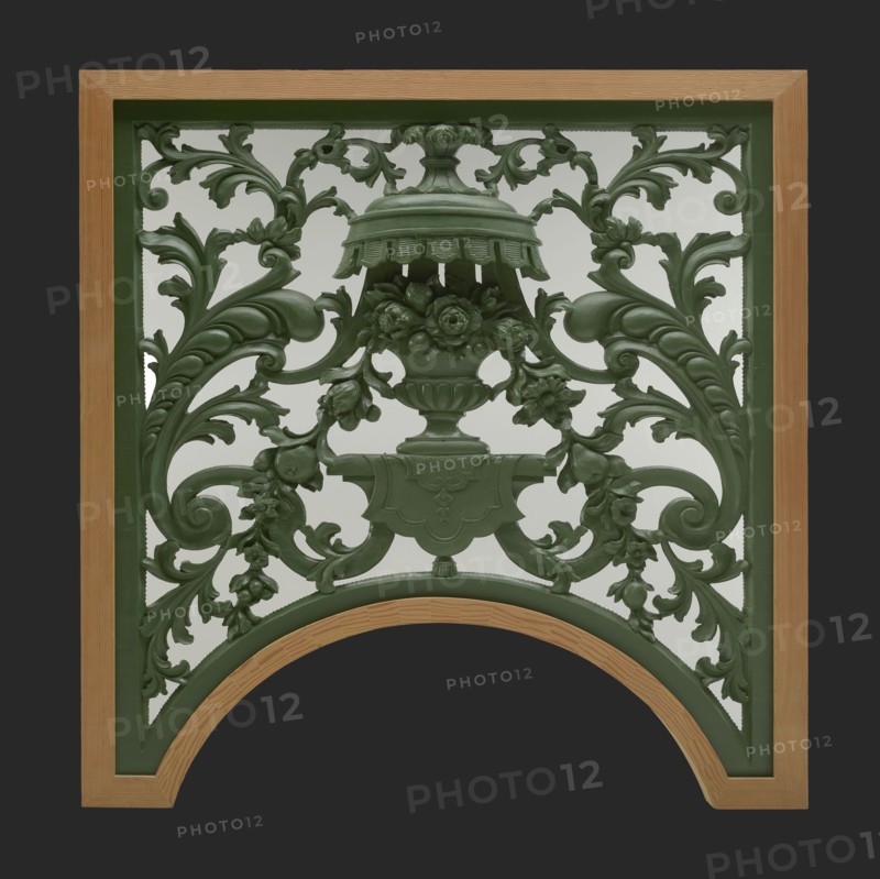 Skylight with carved vase of flowers and leaf motifs, coming from the portal, cutting window surface light wood carving