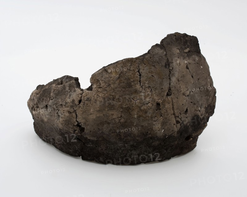 Border fragment of pottery pot from the middle iron age (800-500 BC), storage jar pot holder soil found ceramic earthenware