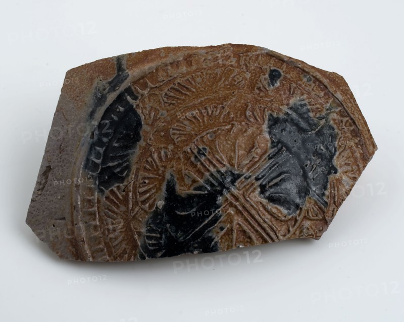 Abdominal fragment of stoneware Bartmann jug, also called Bellarmine jug, with cartouche, in which cross, beardmug tableware