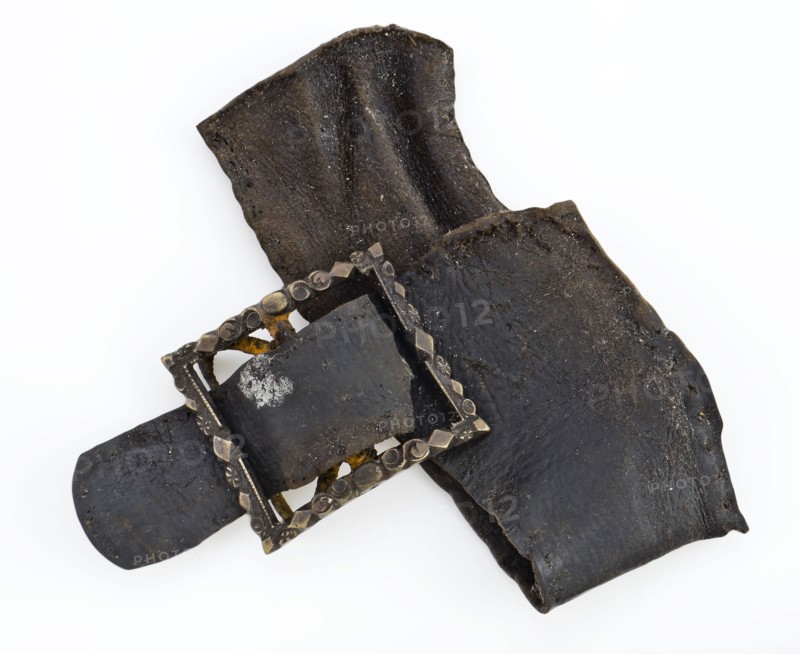 Shoe buckle, decorated buckle with leather transverse belt, buckle fastener component soil find iron copper leather metal