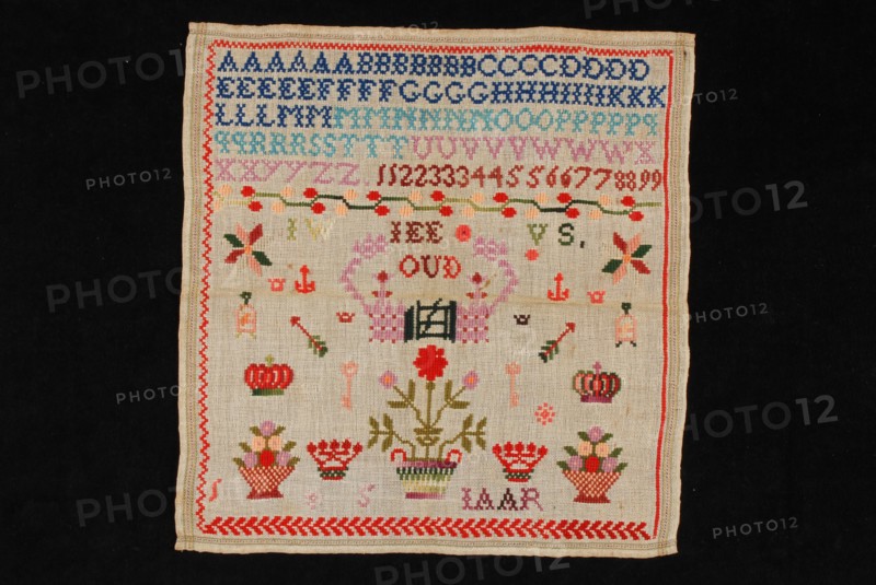 Johanna Wilhelmina van Stolk, Sampler or lettercloth worked in cross stitch in colored wool on coarse unbleached linen canvas