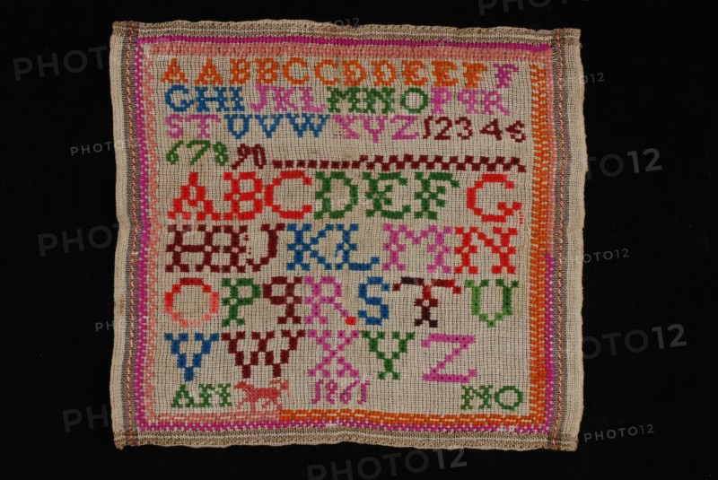 Sampler or lettercloth worked in multicolored wool on gray coarse matting canvas of cotton, ANNO 1861, lettercloth sampler