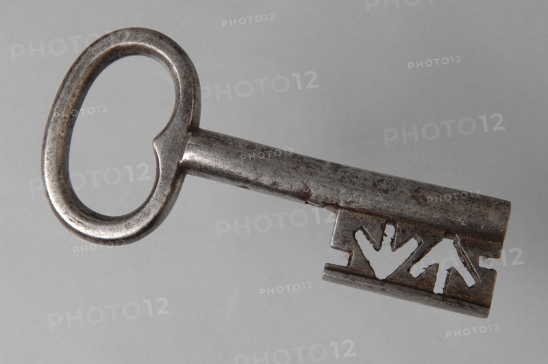 Iron key with heart-shaped eye, hollow key handle and cruciform beards in beard, key iron iron, hand forged Key with heart