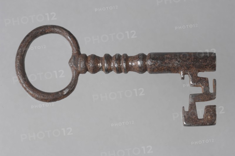 Iron key with heart-shaped eye, solid decorated key handle and cruciform beards in beard, key iron iron, hand-forged Key