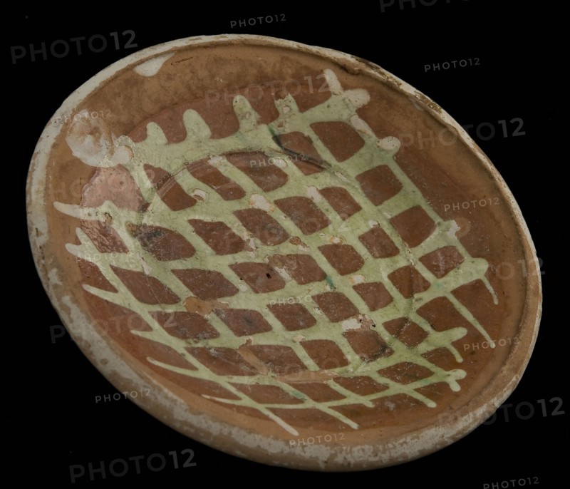 Pottery plate, waffle plate with white silt decoration, plate dish crockery holder soil find ceramic earthenware glaze lead