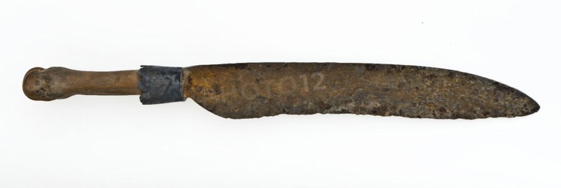 Knife with elongated blade, metal handle protector and short, legs handle, knife cutlery soil find iron bone copper? metal