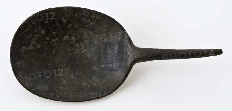 Spoon with shallow oval bowl and thin round stem, spoon cutlery soil find copper metal, Copper spoon with short handle. Oval