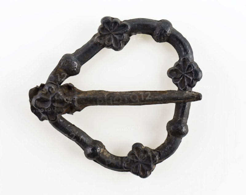 Three-sided pewter clasp with full length angel, bracket with three rosettes, buckle fastener component soil find tin metal