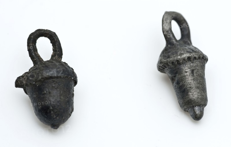 Two charms or pendants in the form of acorns, with hanging eye, charm pendant jewel clothing accessory clothing soil find tin