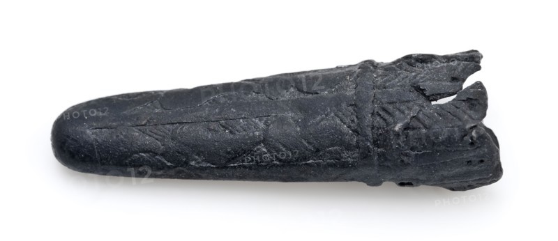 Point of knife edge or quiver with linear decoration, leather fitting, sheath casing batter ground find tin metal, cast Leather