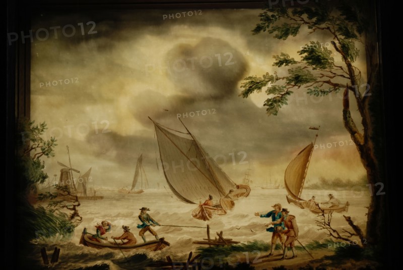 Perspective box of black lacquered wood with three painted glass plates: river view with sailboats, ships and walkers