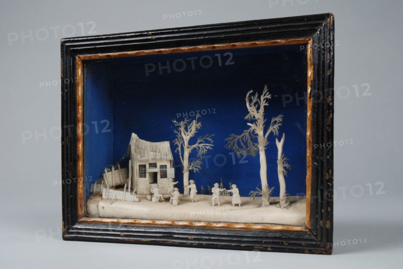 Bavelaar, small viewing box with rural scene: party people at home with trees, diorama footage bone wood paint glass paper