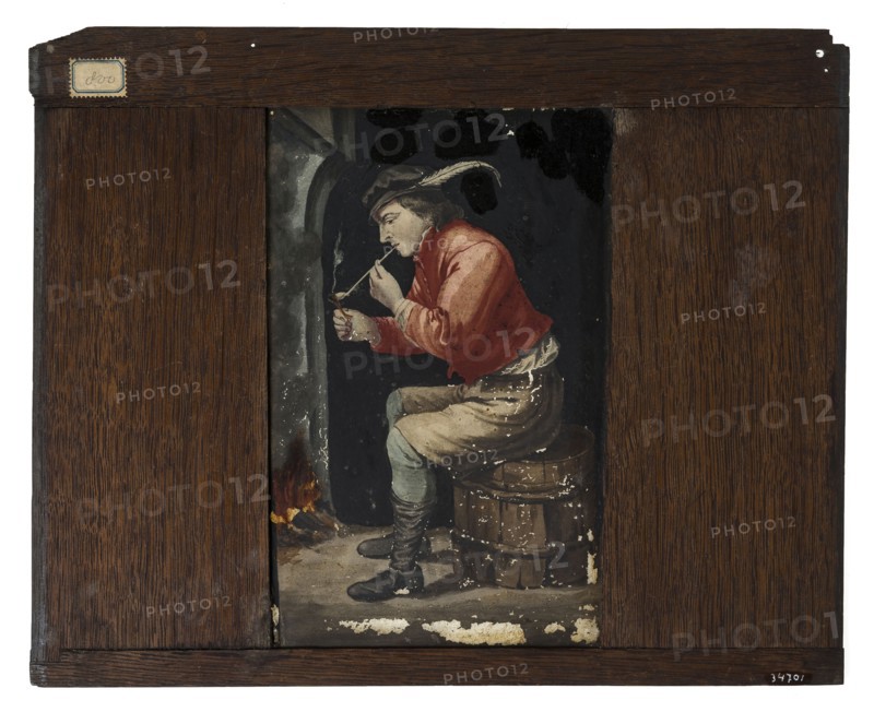 Hand-painted glass plate in wooden frame for illumination cabinet, illustration man with pipe on barrel, slide plate diapositive